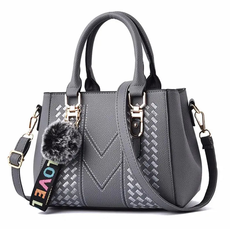 Bolsa de Mensageiro de Couro Bordado