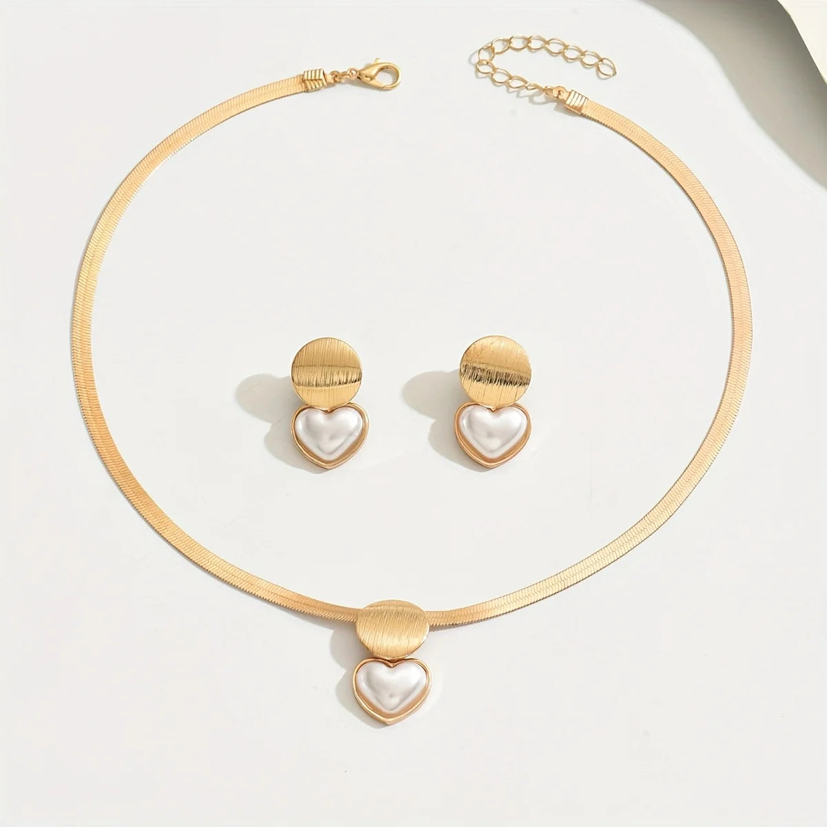 Conjunto de pingentes de coração e geométricos