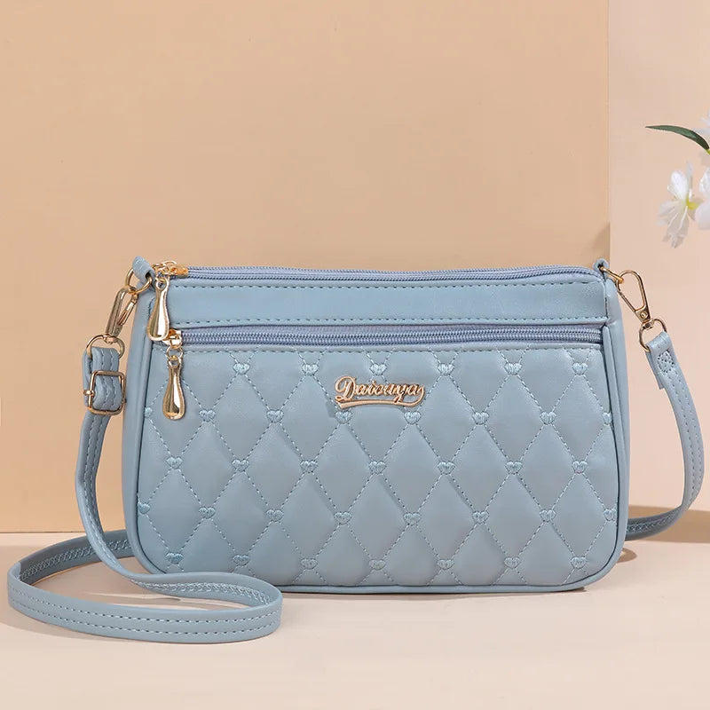 Bolsa de Mensageiro de Couro Bordado