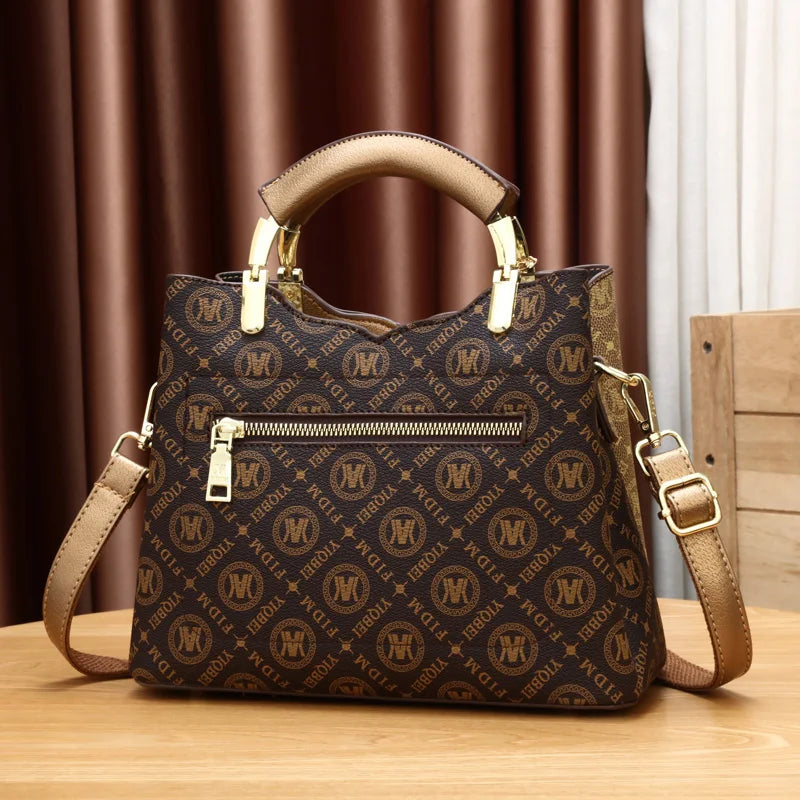 Conjunto de bolsa tote de couro sintético com estampa geométrica