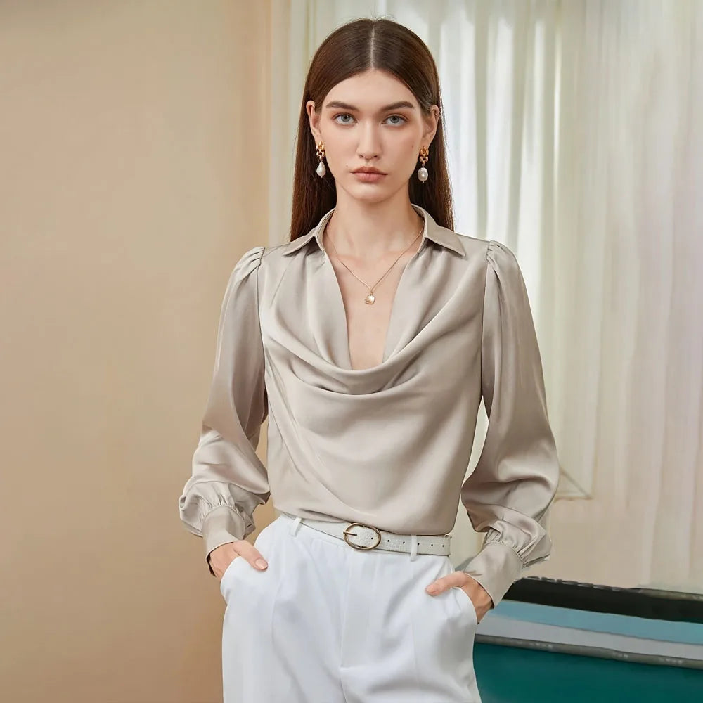 Blusa caída dobras gola V