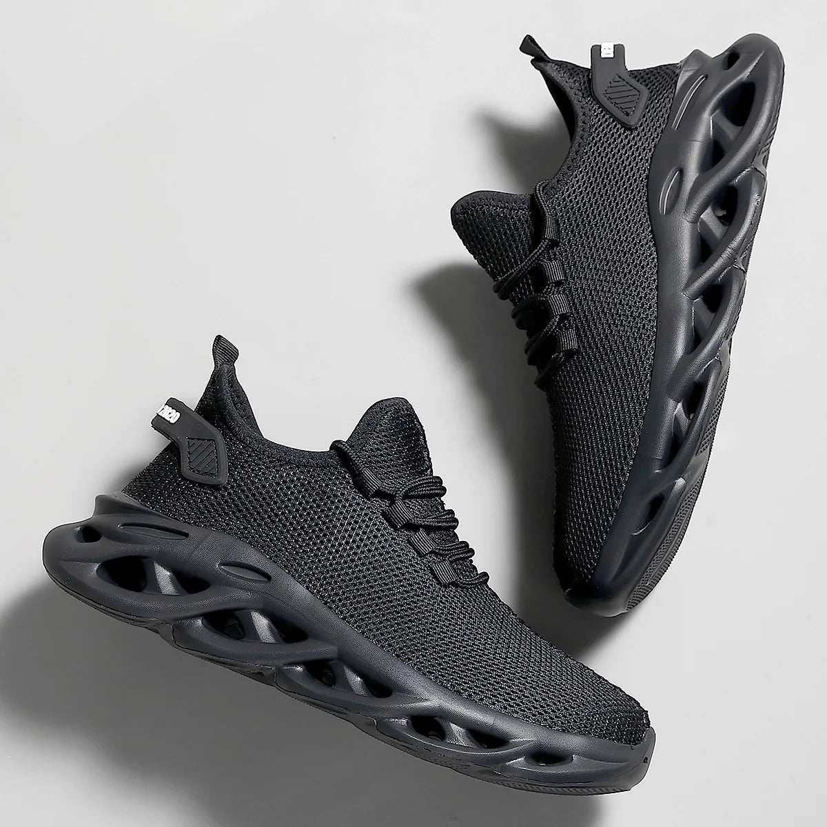 Tênis esportivos casuais malha