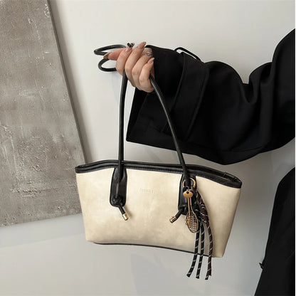 Bolsa de ombro com alça espaguete