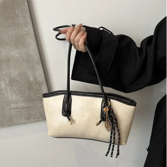 Bolsa de ombro com alça espaguete