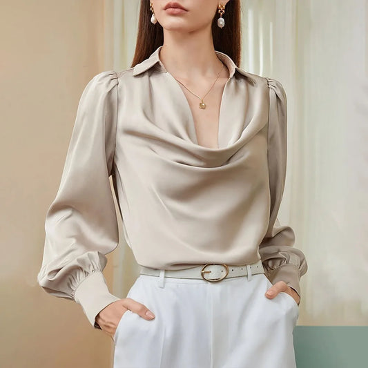 Blusa caída dobras gola V