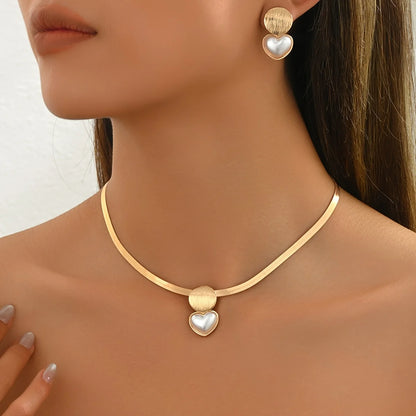 Conjunto de pingentes de coração e geométricos