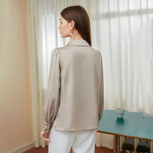 Blusa caída dobras gola V